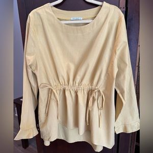 Cellabie mustard gold cotton tunic with adjustable gather detail in front.